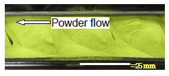 Figure 1: Developer powder flow in a channel observed with visible ray